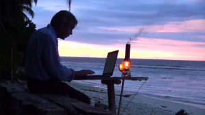 French working from a desert island