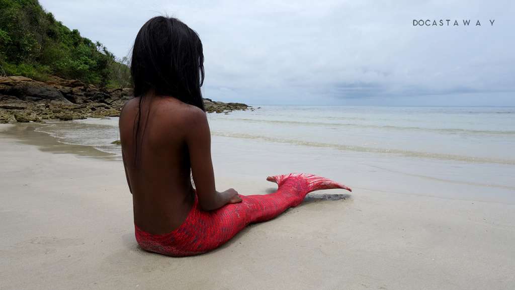 Black African Mermaid Sitting Beach